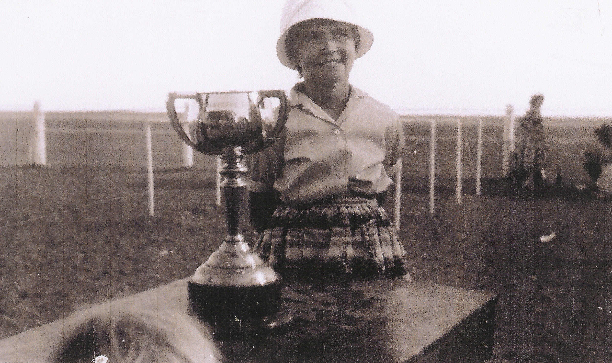 Theresa Eckford with Melbourne Cup, Julia Creek 1950s